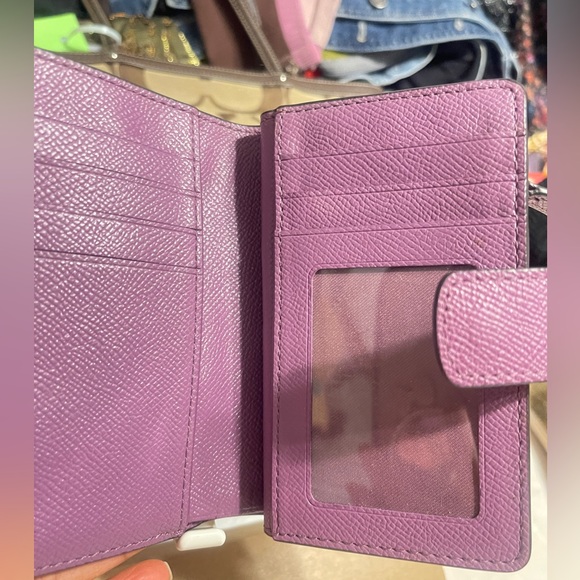 Coach Metallic Purple Wallet
$45 $165 - Picture 9 of 9